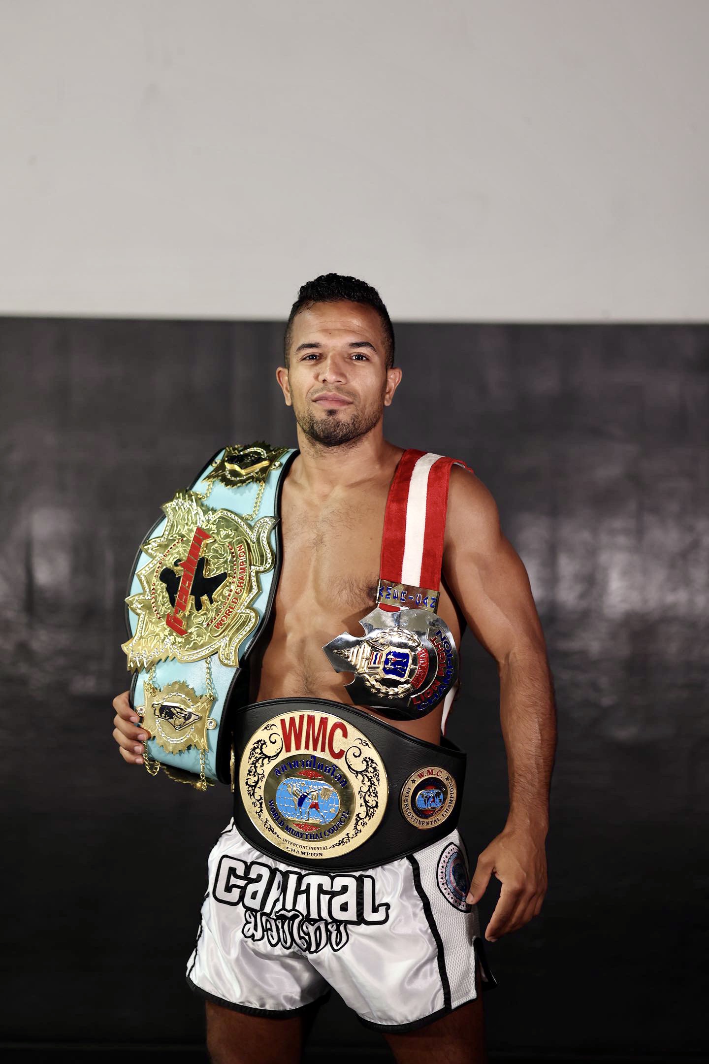 Amine Ballafrikh with championship belts